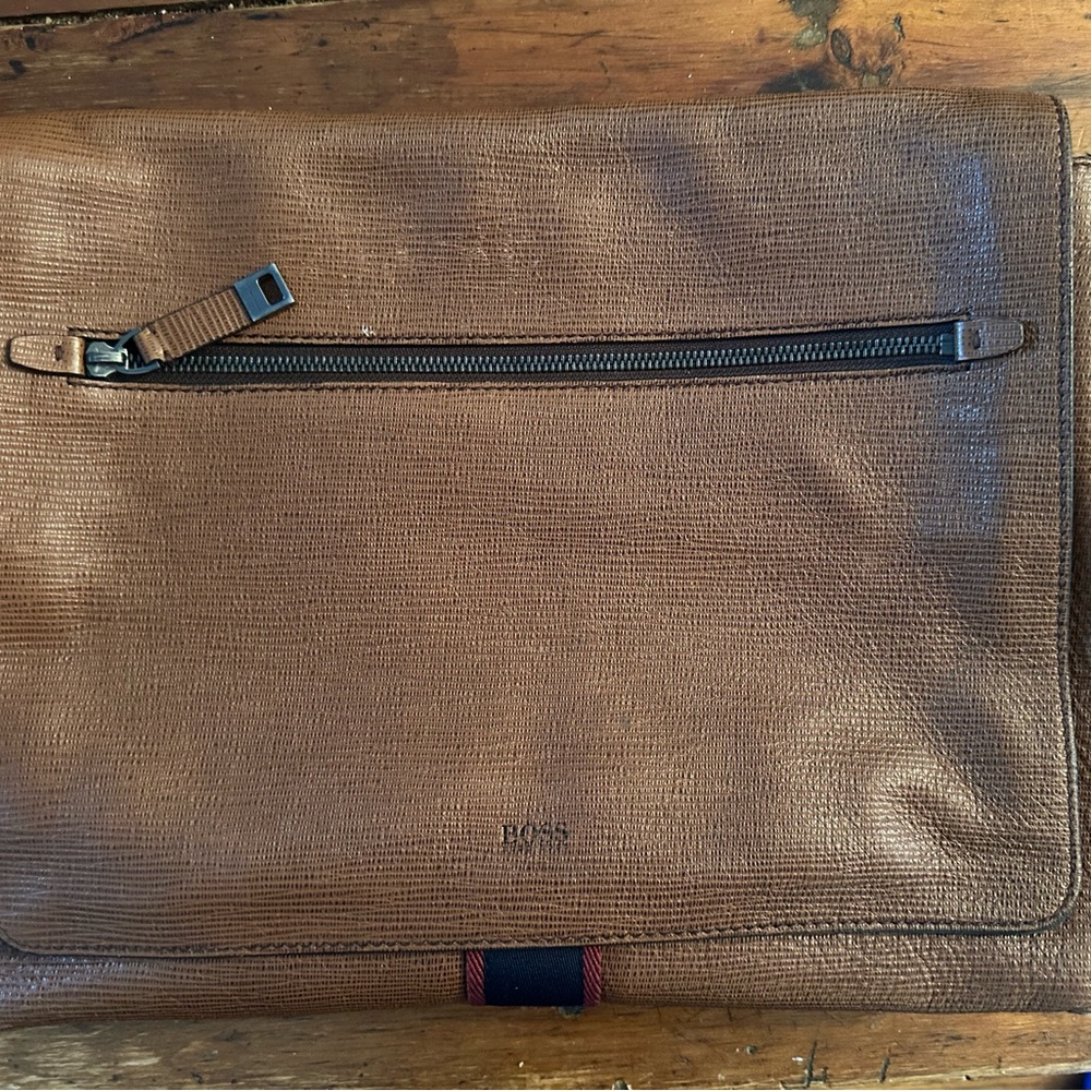 Sleek Black Laptop Bag with Padded Interior and Adjustable Strap